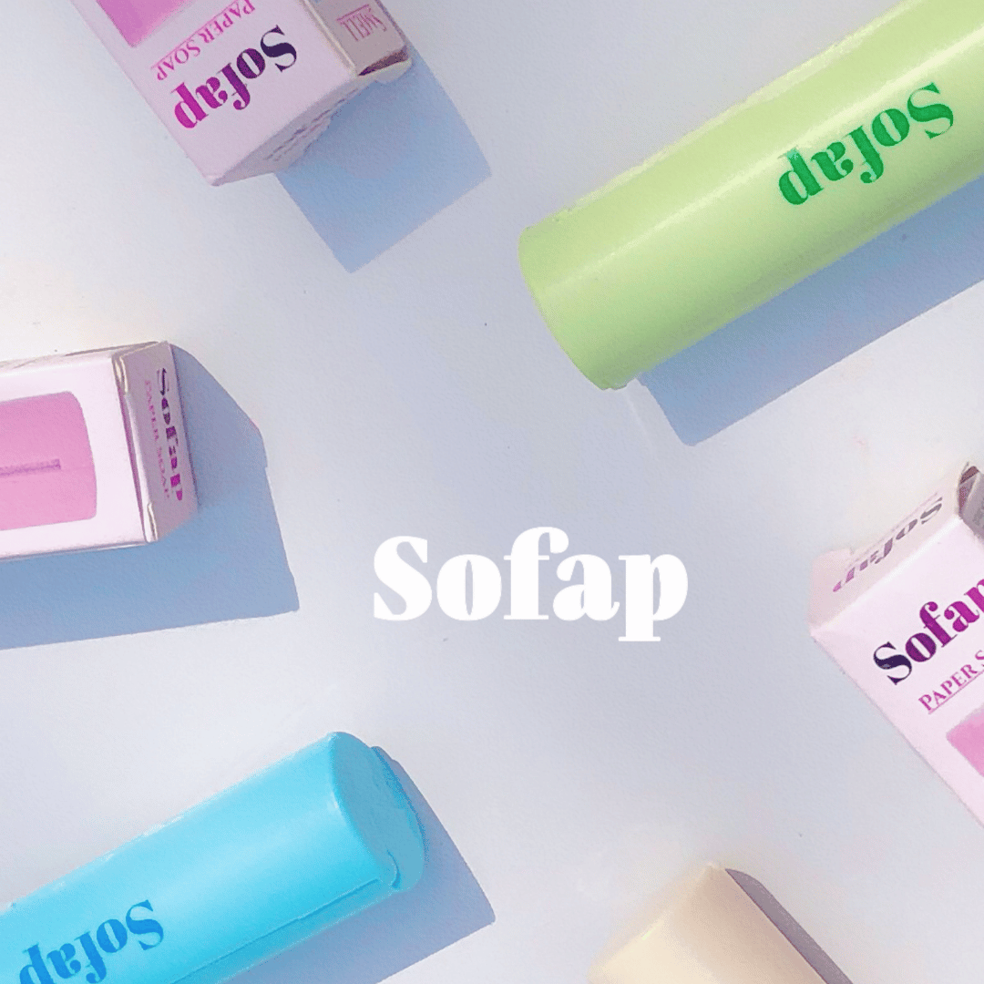 A collection of Sofap soaps in various colors, including pink, green, blue, and yellow, arranged in a visually appealing manner with the brand name 'Sofap' prominently displayed.